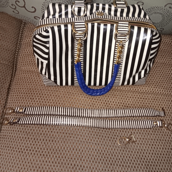 Henri Bendel rare leather barrel bag with extra straps